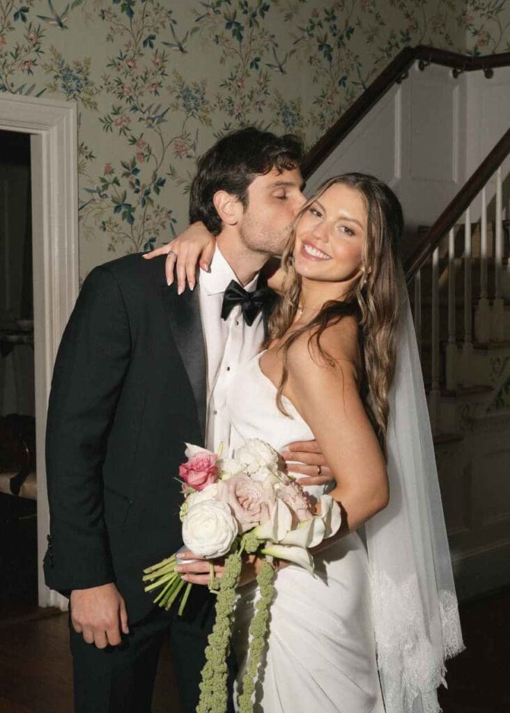 bride and groom inside of the legare waring house in charleston, sc after getting married