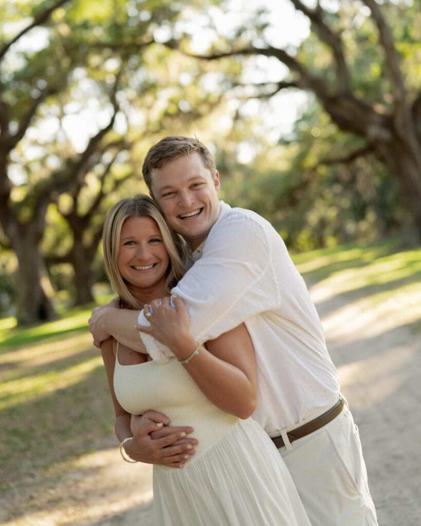 bride and groom to be under the oak trees on hilton head island sc 